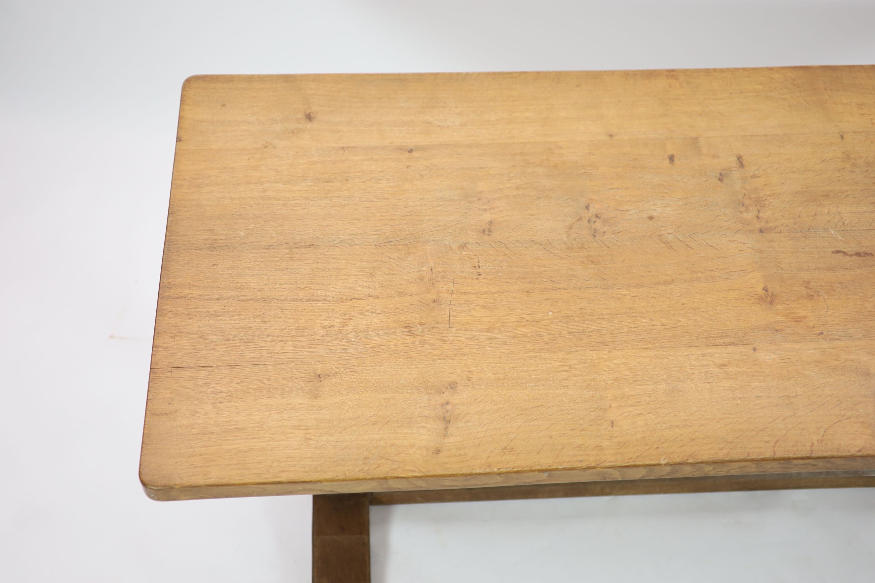 A Robert Thompson Mouseman adzed oak refectory table, W.180cm D.86cm H.74cm
